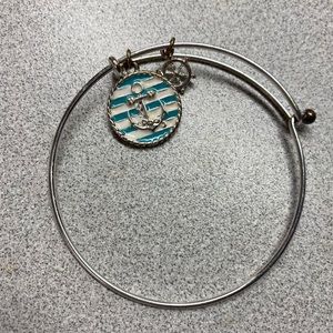 Silver bracelet with teal anchor charm